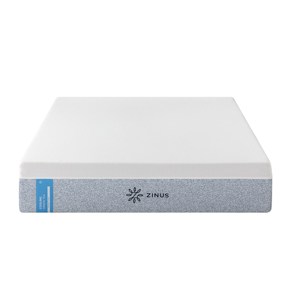 Zinus Balanced Comfort Signature Memory Foam Mattress shown in front silo view against a plain white background, featuring a white knit top cover and blue-gray woven side panel with Zinus brand tag and cooling icon, showcasing clean edges and uniform thickness.