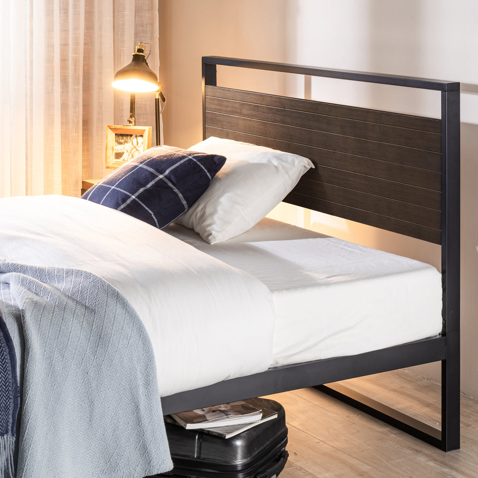 Zinus Suzanne Metal and Bamboo Platform Bed Frame shown in a modern bedroom with gray steel frame and natural bamboo headboard. Durable wood slats provide reliable mattress support while the minimalist design enhances style and functionality