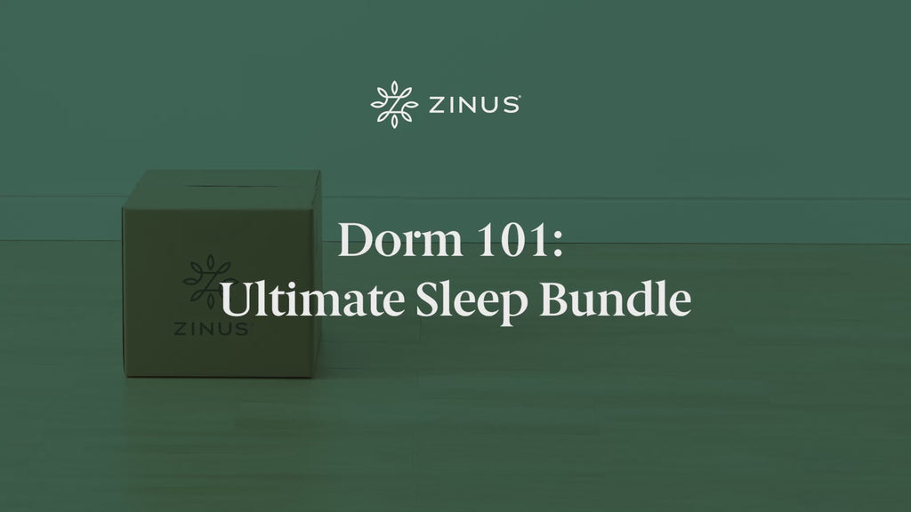 Student unboxing the Dorm 101 Bundle in a bright dorm room, revealing pillows, a cooling topper, and mattress protectorall essentials packed in one compact box.