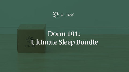 Student unboxing the Dorm 101 Bundle in a bright dorm room, revealing pillows, a cooling topper, and mattress protectorall essentials packed in one compact box.