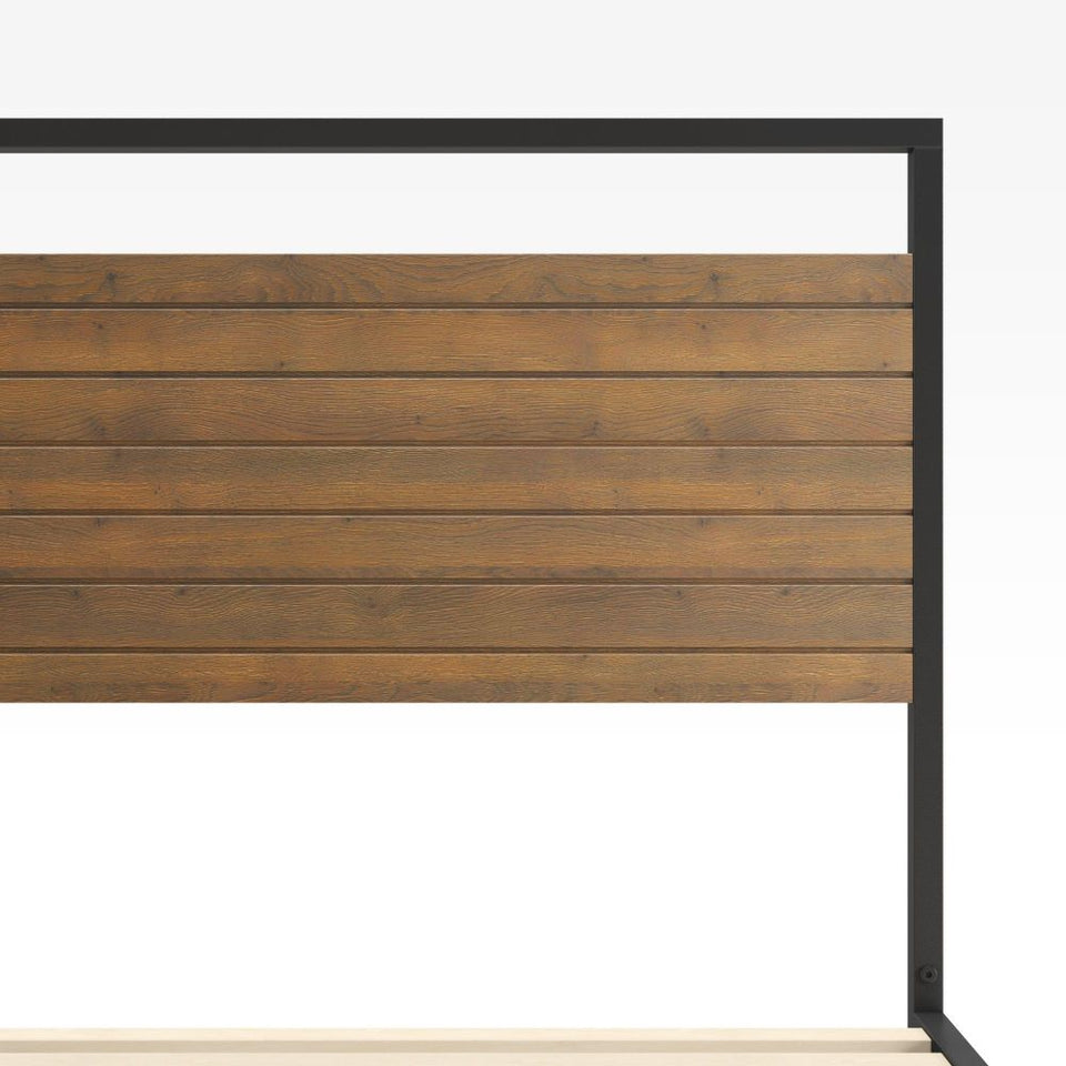 Close-up of Zinus Suzanne Platform Bed Frame bamboo headboard with horizontal paneling framed in black steel. Highlights natural bamboo texture and modern industrial design that blends durability with a clean minimalist look.