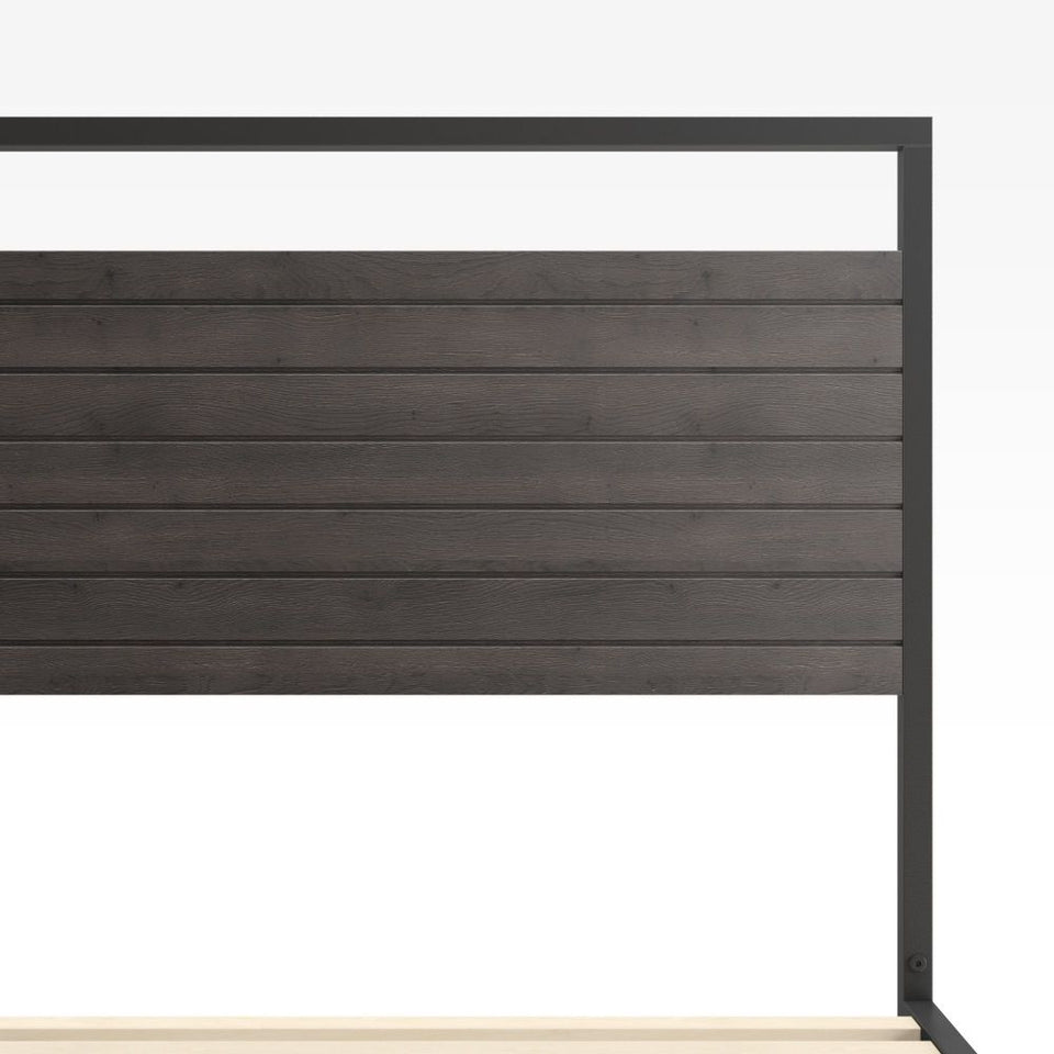 Close-up of Zinus Suzanne Platform Bed Frame bamboo headboard with horizontal paneling framed in black steel. Highlights natural bamboo texture and modern industrial design that blends durability with a clean minimalist look.
