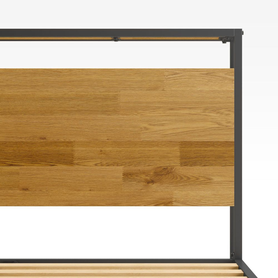 Detail of bamboo headboard on Zinus Suzanne Metal and Bamboo Platform Bed Frame with USB port. Natural bamboo wood paired with a black steel frame creates a strong, modern design that blends durability with eco-friendly style